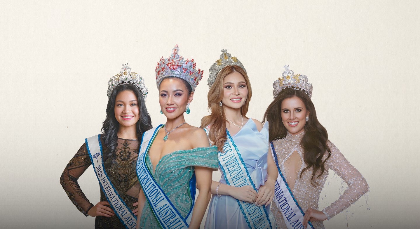 Three Miss International Australia queens wearing their crowns and sashes